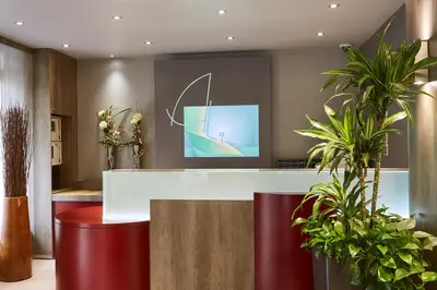 Télévision ou salle de divertissement dans l'établissement Alizé Grenelle Tour Eiffel