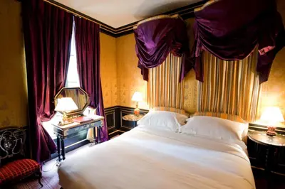 Un ou plusieurs lits dans un hébergement de l'établissement L'Hôtel