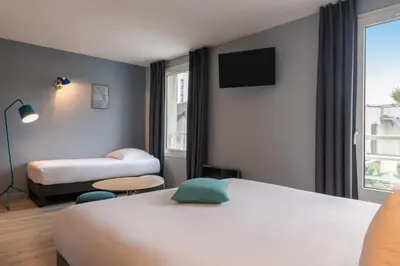 Un ou plusieurs lits dans un hébergement de l'établissement Hôtel Sanso by HappyCulture