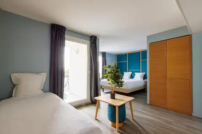 Un ou plusieurs lits dans un hébergement de l'établissement Hôtel Sanso by HappyCulture