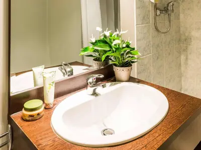 Salle de bains dans l'établissement Aparthotel Adagio Access Paris Vanves - Porte de Versailles