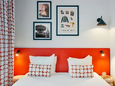 Un ou plusieurs lits dans un hébergement de l'établissement Aparthotel Adagio Access Paris Vanves - Porte de Versailles
