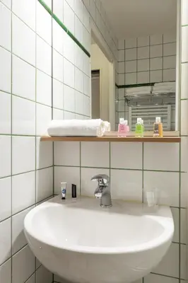 Salle de bains dans l'établissement Aparthotel Adagio Access La Défense - Place Charras