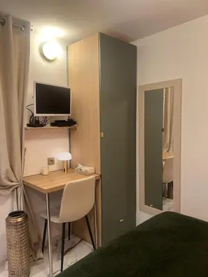 Télévision ou salle de divertissement dans l'établissement Studio Île Saint Louis 75004 Paris