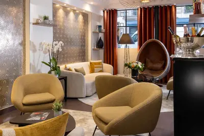 Coin salon dans l'établissement Hotel Elysées Bassano