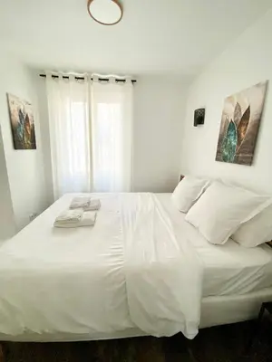 Un ou plusieurs lits dans un hébergement de l'établissement Maison le Bac Apartments