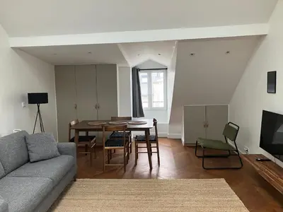 Télévision ou salle de divertissement dans l'établissement Maison le Bac Apartments