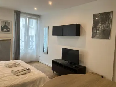 Télévision ou salle de divertissement dans l'établissement Maison le Bac Apartments