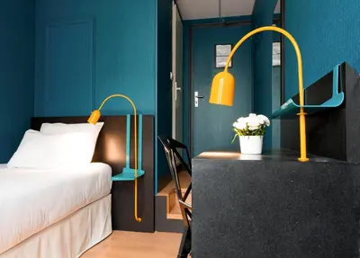 Un ou plusieurs lits dans un hébergement de l'établissement Hotel Daval