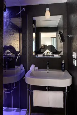 Salle de bains dans l'établissement Les Plumes Hotel