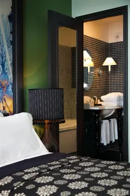 Un ou plusieurs lits dans un hébergement de l'établissement Hotel Fontaines du Luxembourg