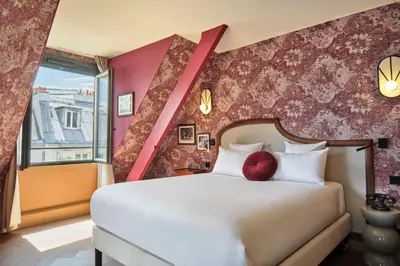 Un ou plusieurs lits dans un hébergement de l'établissement Hôtel Joséphine by Happyculture