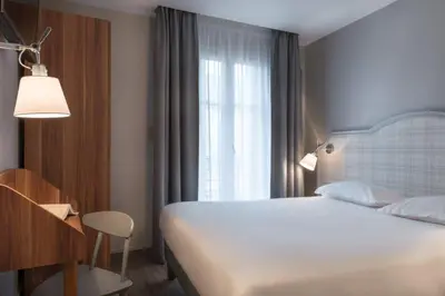 Un ou plusieurs lits dans un hébergement de l'établissement Hotel Boris V. by Happyculture