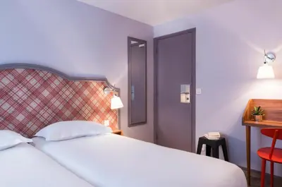 Un ou plusieurs lits dans un hébergement de l'établissement Hotel Boris V. by Happyculture