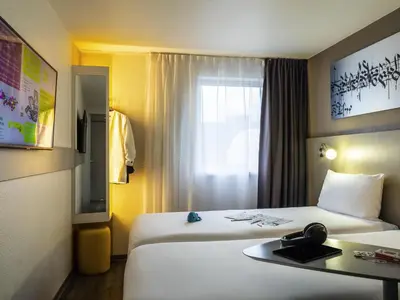 Un ou plusieurs lits dans un hébergement de l'établissement ibis Styles Paris Bercy