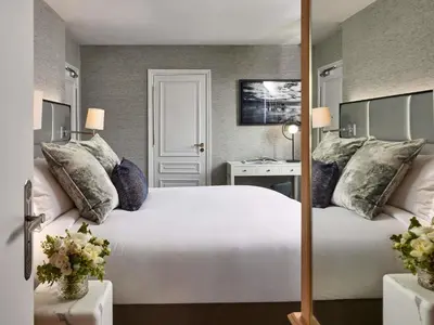 Un ou plusieurs lits dans un hébergement de l'établissement Sofitel Paris Baltimore Tour Eiffel