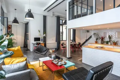 Coin salon dans l'établissement Outstanding Artist Loft - 6 guests - Marais and Canal