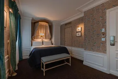 Un ou plusieurs lits dans un hébergement de l'établissement Hôtel De Buci