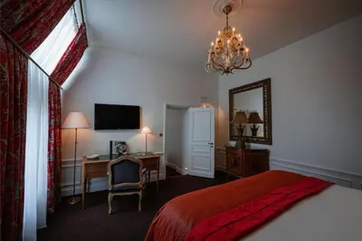 Un ou plusieurs lits dans un hébergement de l'établissement Hôtel De Buci