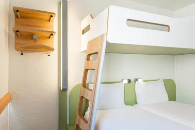 Un ou plusieurs lits dans un hébergement de l'établissement ibis budget Paris Porte de Bercy