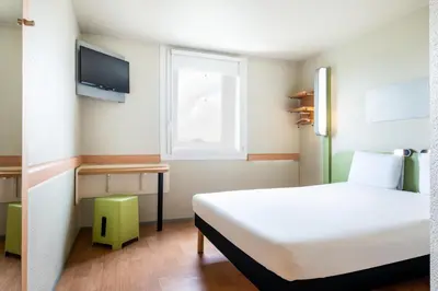 Un ou plusieurs lits dans un hébergement de l'établissement ibis budget Paris Porte de Bercy