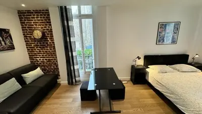 Un ou plusieurs lits dans un hébergement de l'établissement Gorgeous Paris Eiffel Tower