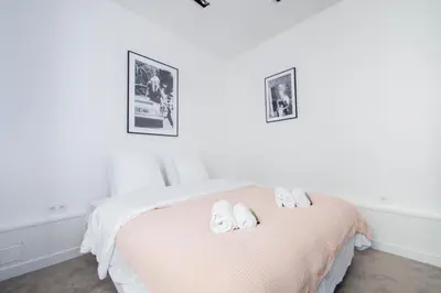 Un ou plusieurs lits dans un hébergement de l'établissement Dreamyflat - Eiffel tower