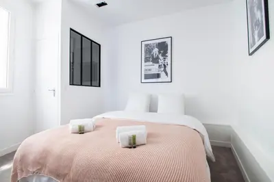 Un ou plusieurs lits dans un hébergement de l'établissement Dreamyflat - Eiffel tower