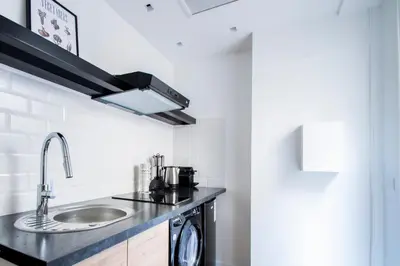 Cuisine ou kitchenette dans l'établissement Dreamyflat - Eiffel tower