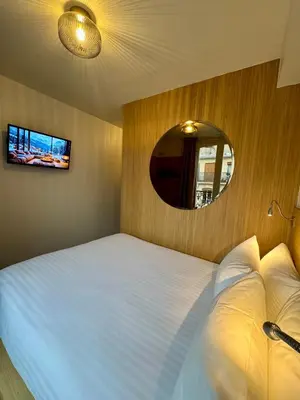 Un ou plusieurs lits dans un hébergement de l'établissement Hôtel Montmartre - Nouvellement Rénové
