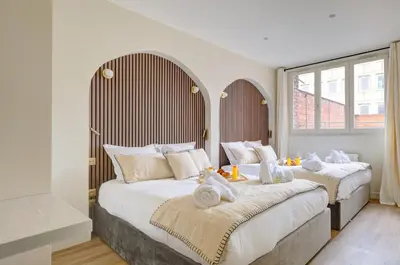 Un ou plusieurs lits dans un hébergement de l'établissement 201 Suite Anne - Superbe appartement