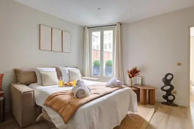 Un ou plusieurs lits dans un hébergement de l'établissement 201 Suite Anne - Superbe appartement