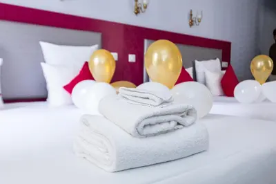 Un ou plusieurs lits dans un hébergement de l'établissement HOTEL DE PARIS MONTPARNASSE