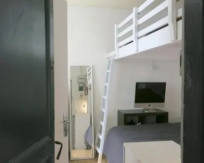 Télévision ou salle de divertissement dans l'établissement Mini Loft Del Sarte CityCosy