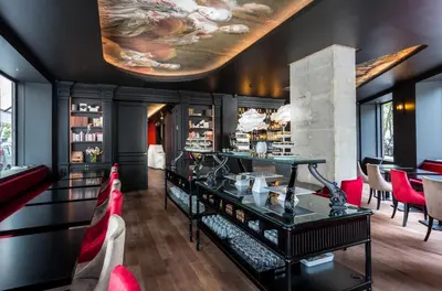 Coin salon dans l'établissement Hôtel La Comtesse