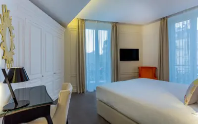 Télévision ou salle de divertissement dans l'établissement Hôtel La Comtesse
