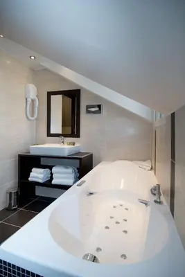 Salle de bains dans l'établissement Hotel Choiseul Opera