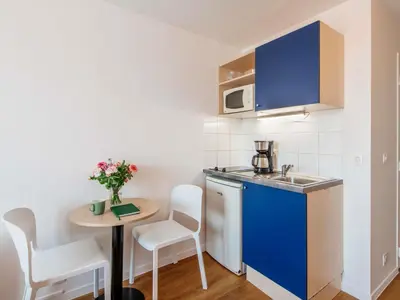 Cuisine ou kitchenette dans l'établissement Aparthotel Adagio Access Paris Saint-Denis Pleyel