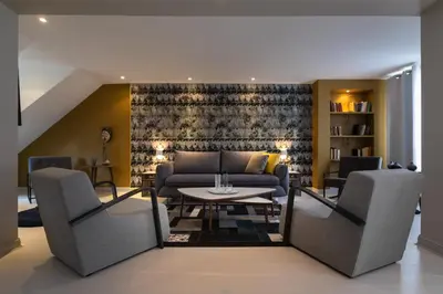 Coin salon dans l'établissement Résidence & Spa Le Prince Régent