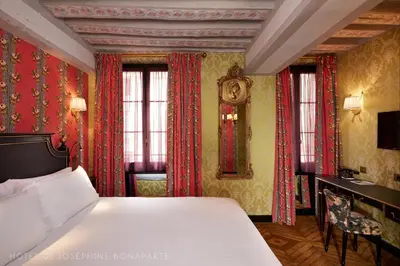 Un ou plusieurs lits dans un hébergement de l'établissement Hôtel de Joséphine BONAPARTE
