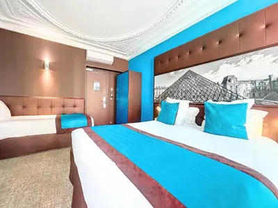 Un ou plusieurs lits dans un hébergement de l'établissement Best Western Nouvel Orléans Montparnasse