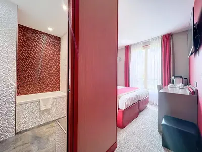 Un ou plusieurs lits dans un hébergement de l'établissement Best Western Nouvel Orléans Montparnasse
