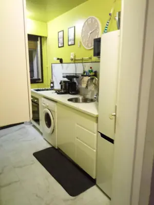 Cuisine ou kitchenette dans l'établissement Au pied de la tour Eiffel Trocadéro