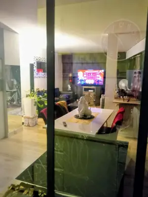 Télévision ou salle de divertissement dans l'établissement Au pied de la tour Eiffel Trocadéro