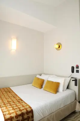 Un ou plusieurs lits dans un hébergement de l'établissement Five Boutique Hotel Paris Quartier Latin