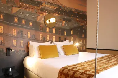Un ou plusieurs lits dans un hébergement de l'établissement Five Boutique Hotel Paris Quartier Latin