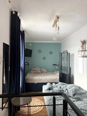 Un ou plusieurs lits dans un hébergement de l'établissement Duplex Atypique Paris 13 Station F Bercy