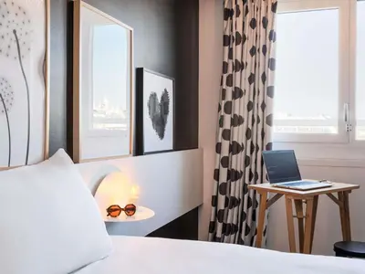 Un ou plusieurs lits dans un hébergement de l'établissement ibis Styles Paris Gare de l'Est Château Landon