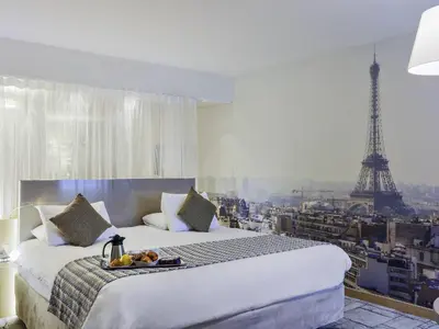 Un ou plusieurs lits dans un hébergement de l'établissement Mercure Paris Vaugirard Porte De Versailles
