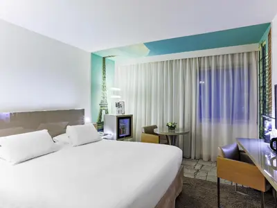 Un ou plusieurs lits dans un hébergement de l'établissement Mercure Paris Vaugirard Porte De Versailles